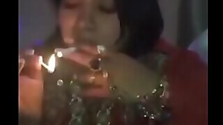 Indian alkie woman exploitatory gasconade sheik close by smoking smoking
